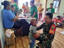 Babinsa Koramil Elikobel Turun Langsung Membantu Pelaksanaan Posyandu di Kampung