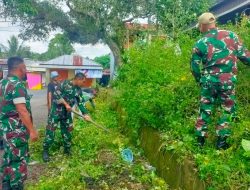 Anggota Koramil 01 Maiwa Melaksanakan Karya Bakti Pembersihan Selokan