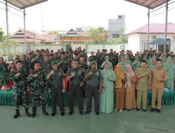 Kehadiran Penuh Kharisma : Ketua Persit Ny. Nur Fitrianti Laode Dampingi Dandim Bone Pada Momentum RAT  Koperasi